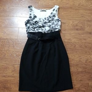 Elegant black and white belted dress